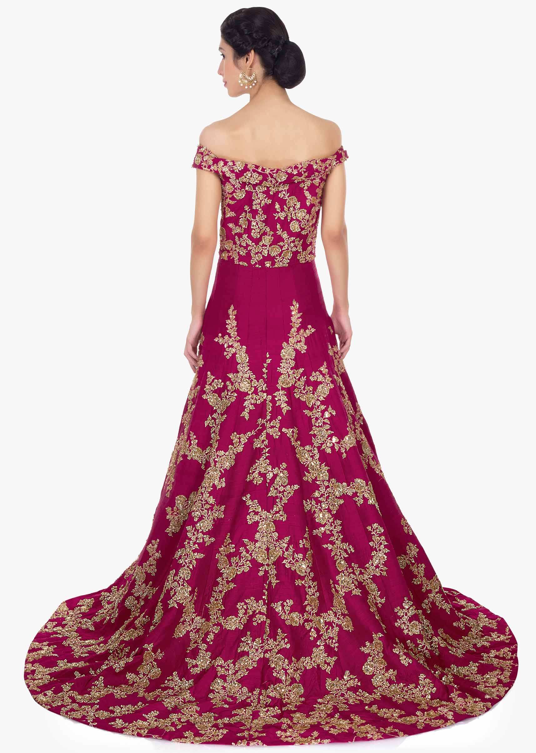 Magenta raw silk embroidered gown with trail at the back