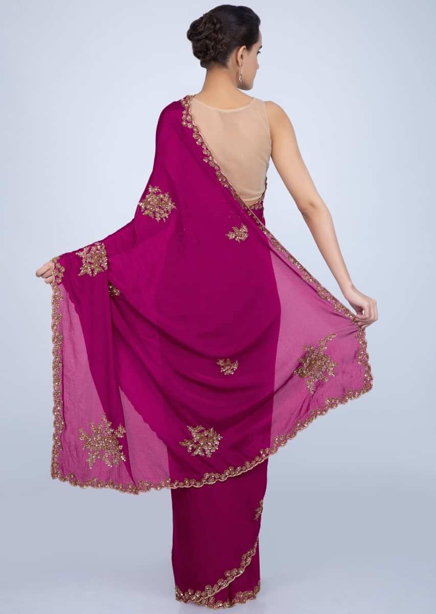 Magenta satin chiffon saree with embroidered butti and border only on Kalki