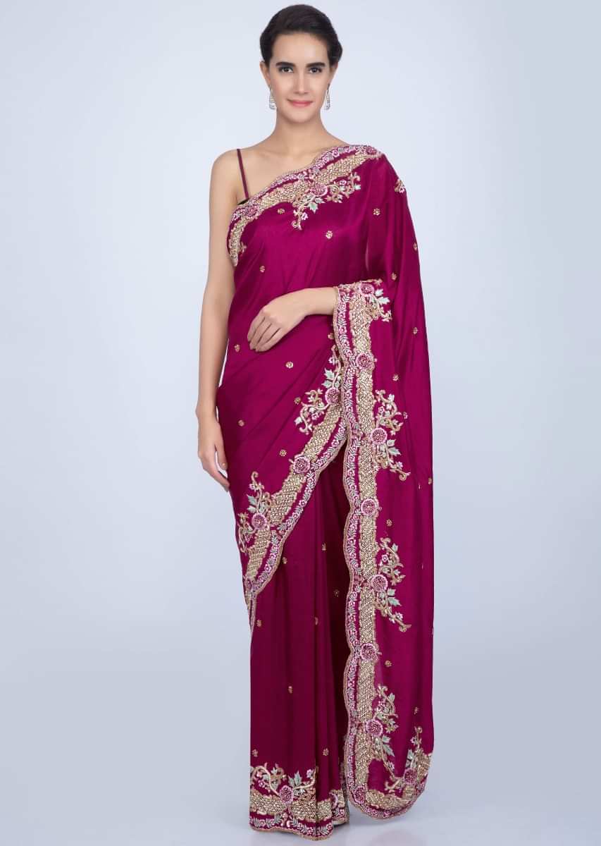 Magenta silk saree with butti and scallop embroidered border only on Kalki