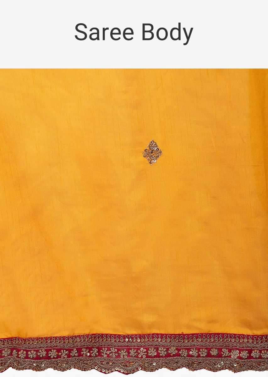Mango yellow silk saree with embroidered butti and border only on kalki