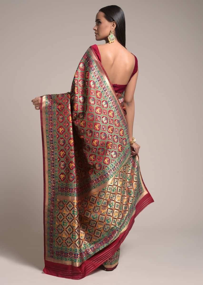 Maroon art handloom Saree In Silk With Colorful Woven Patola Jaal Online - Kalki Fashion
