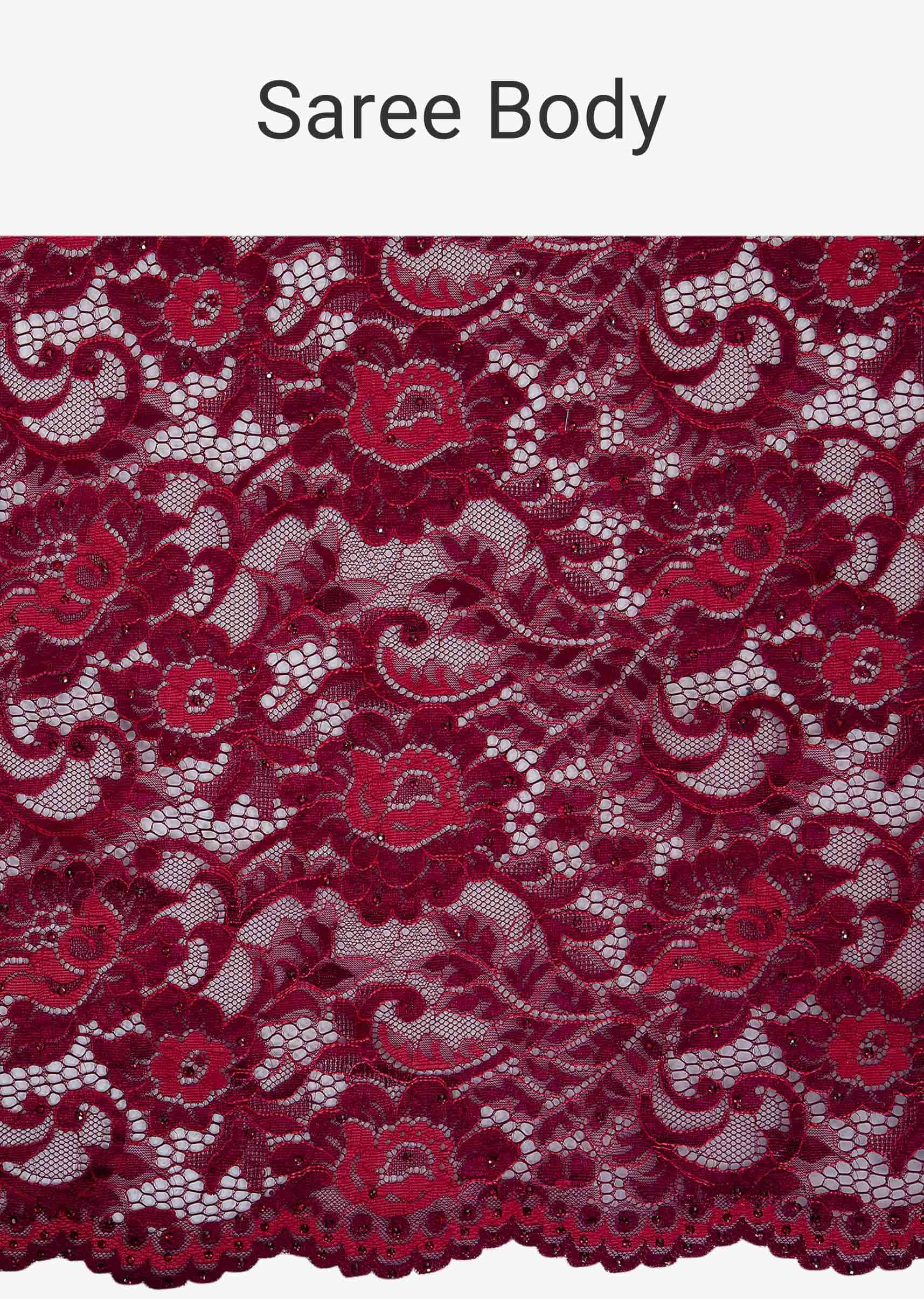 Maroon chantilly lace  saree highlighted in kundan  stone