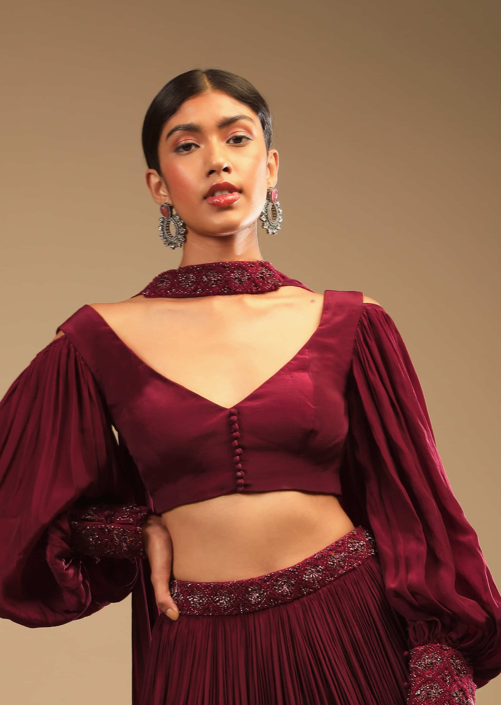 Maroon Lehenga In Crepe With Embroidery Detailing On The Waist And Bishop Sleeved Crop Top 
