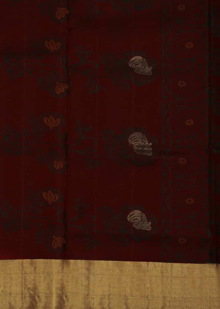 Maroon saree in rose motif weaved  all over only on Kalki