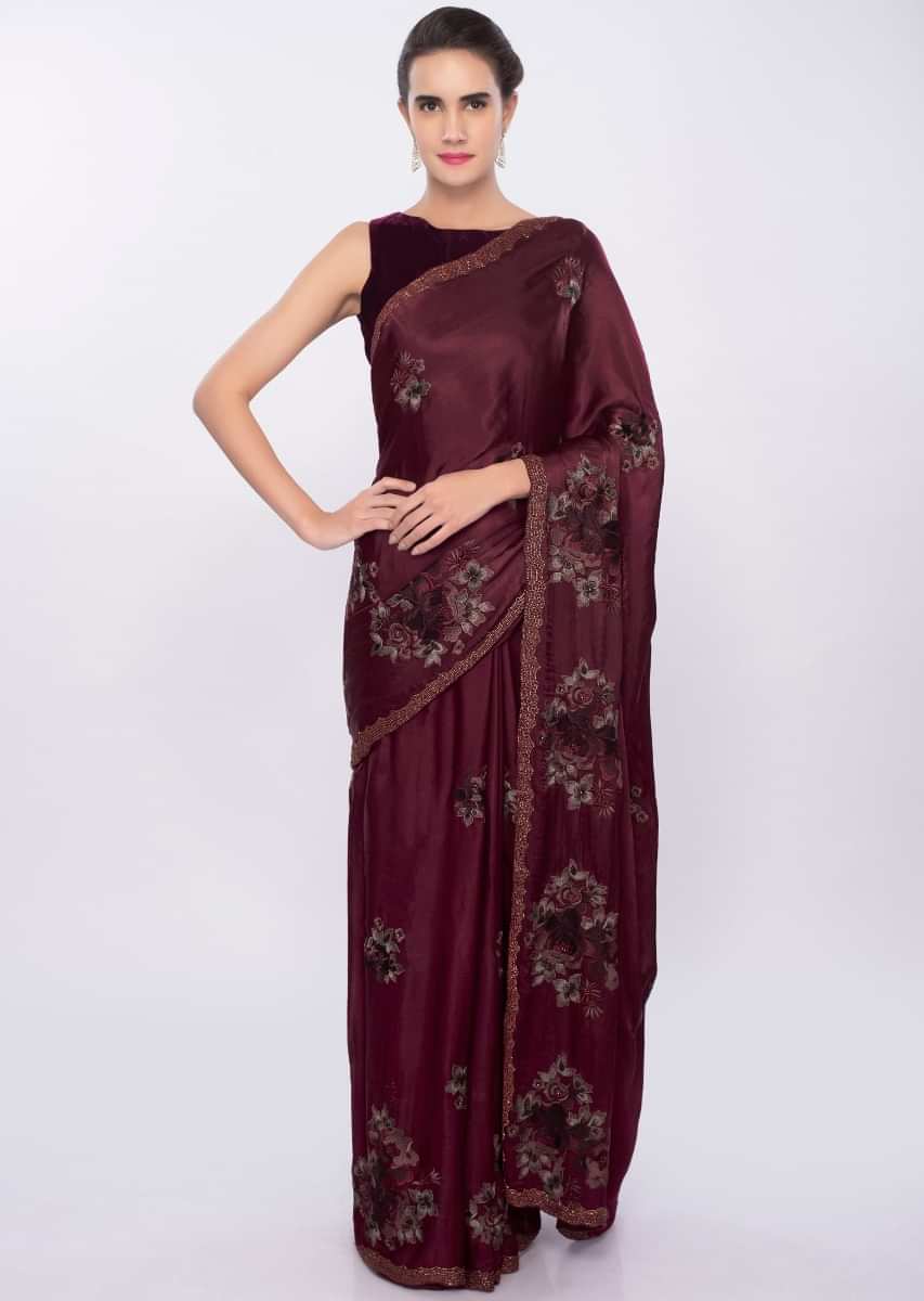 Maroon satin chiffon saree in floral resham embroidered along with cut dana and moti only on Kalki