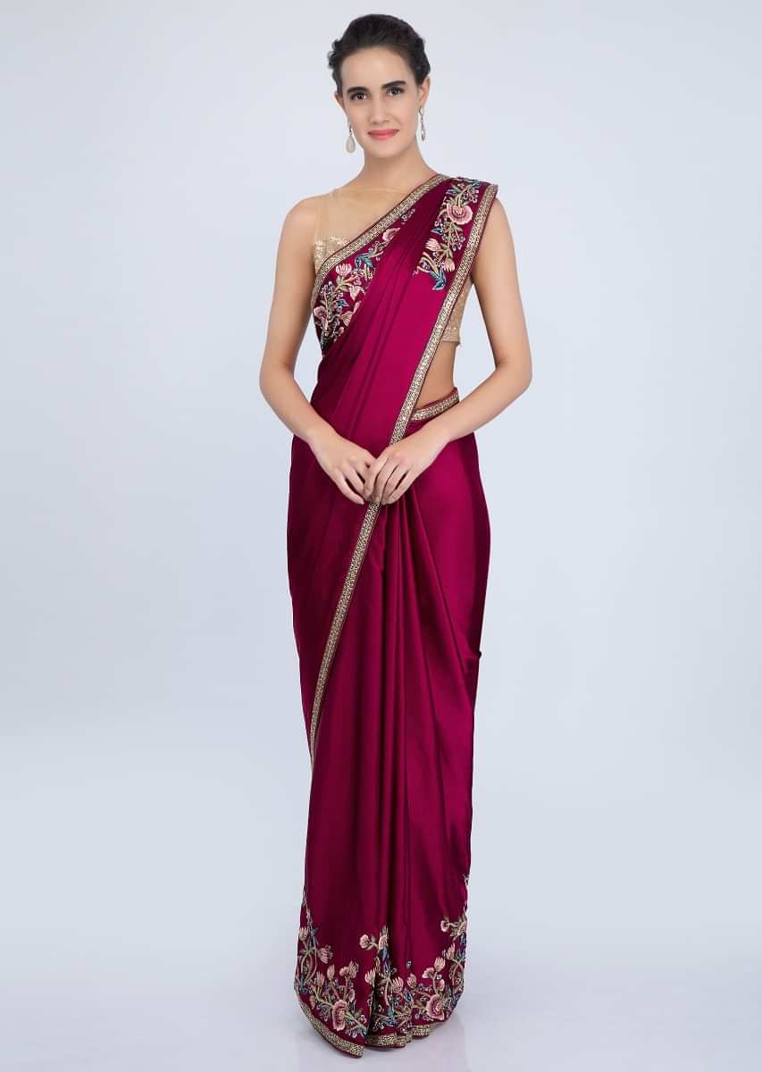 Maroon satin saree with multi color floral embroidered border only on kalki