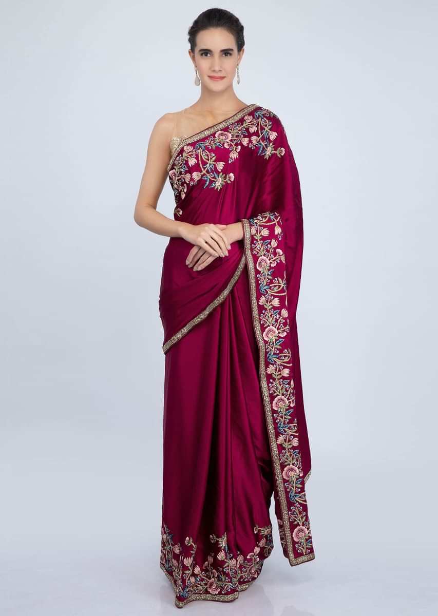 Maroon satin saree with multi color floral embroidered border only on kalki