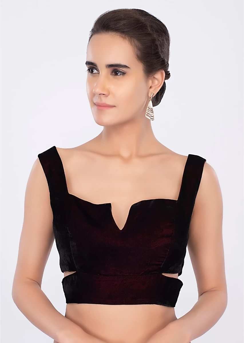 Maroon Sleeveless Blouse With Side Cut Outs And Fancy Cut Symmetric Neckline