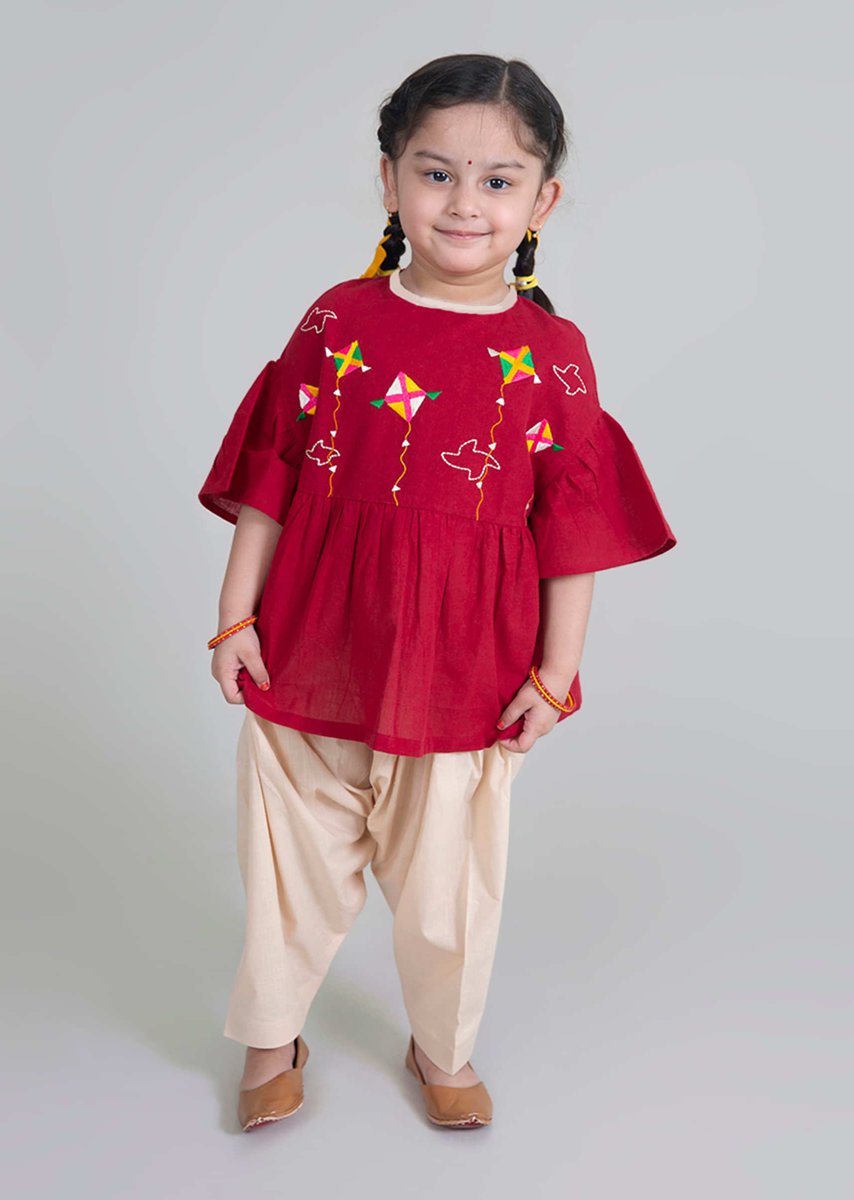 Kalki Girls Maroon Dhoti Suit With Phulkari Inspired Kite Motifs By Tiber Taber