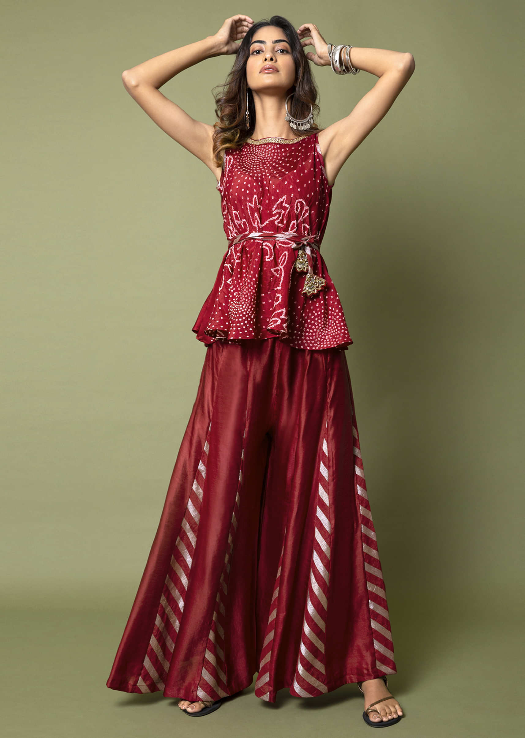 Maroon Flared Top With Bandhani And Antique Gold Hand Embroidery Paired With Zari Striped Paneled Sharara Pants  