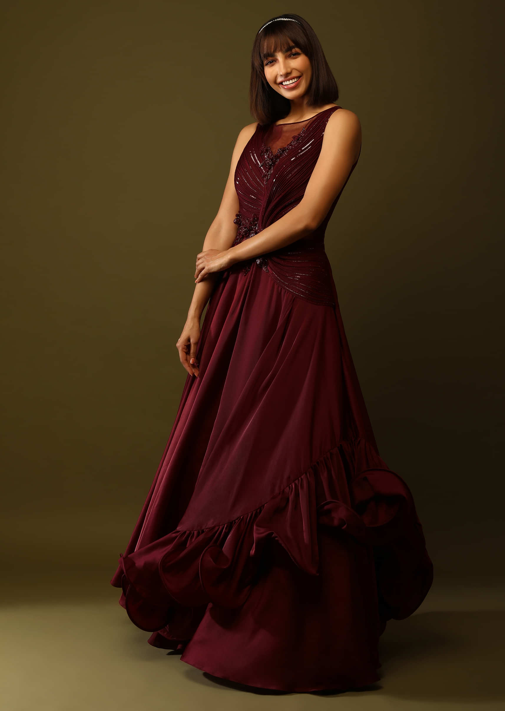 Maroon Gown With Ruched Bodice And Fancy Ruffled Hem  