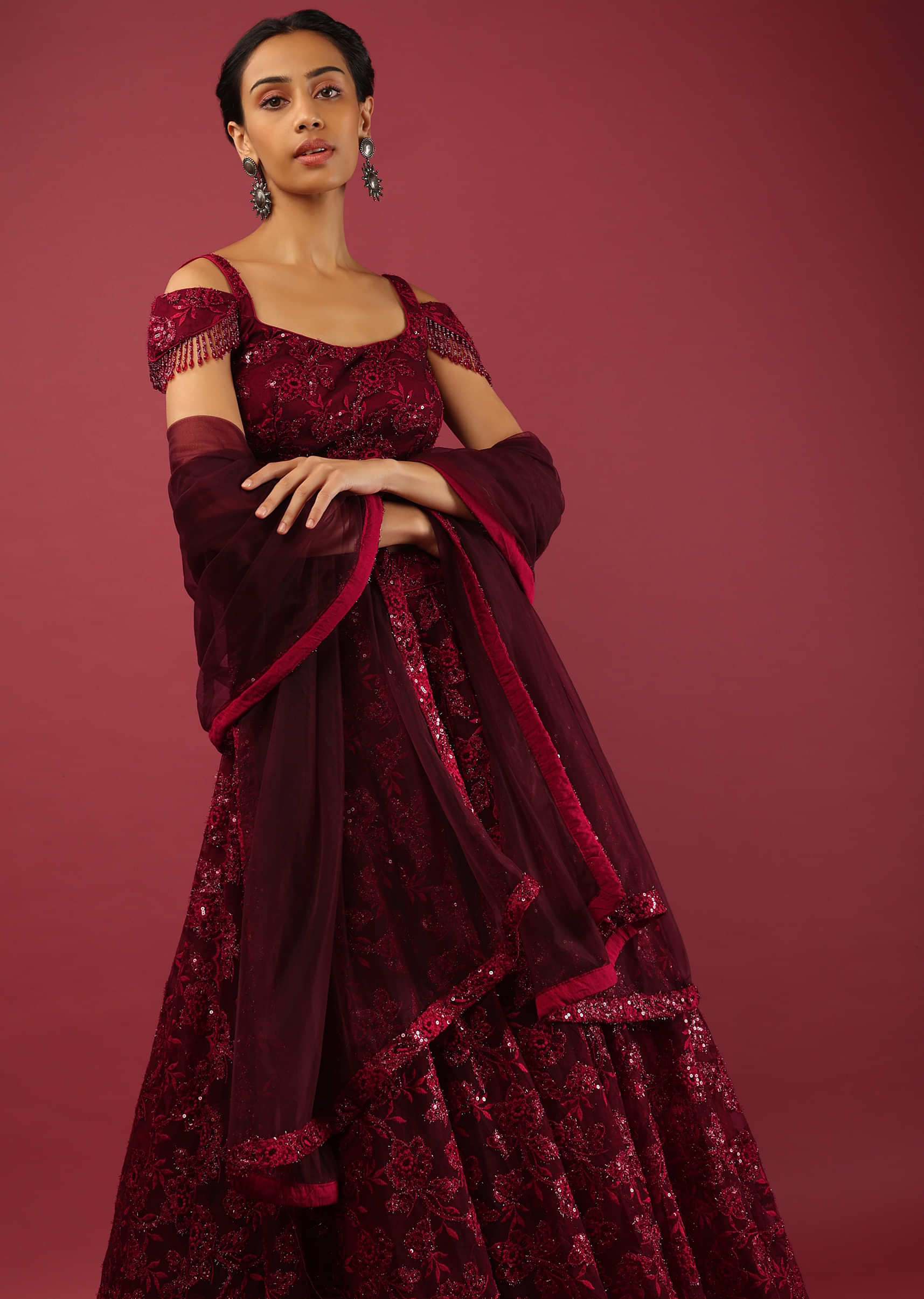 Maroon Lehenga Choli In Embroidered Net With Bead Fringes On The Cold Shoulder Sleeves 