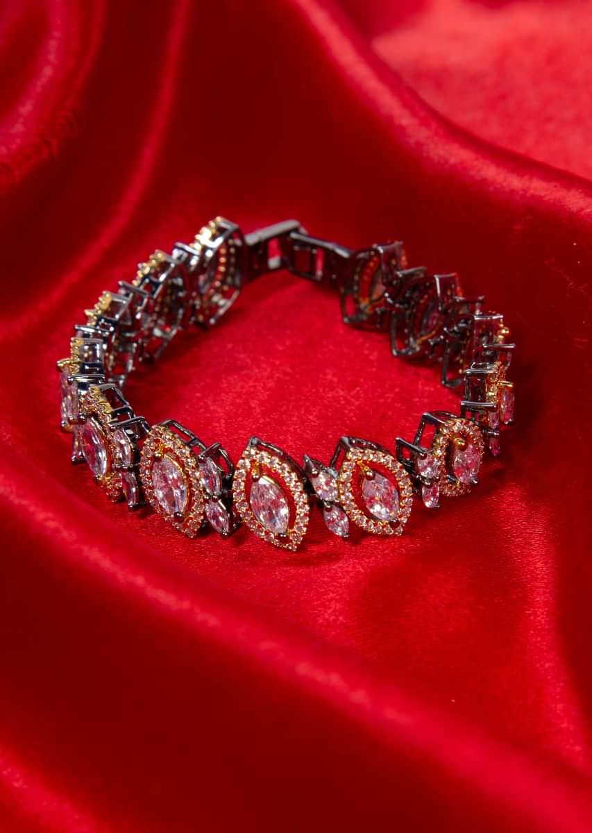 Marquise cut golden stone studded bracelet with crystal bead only on Kalki