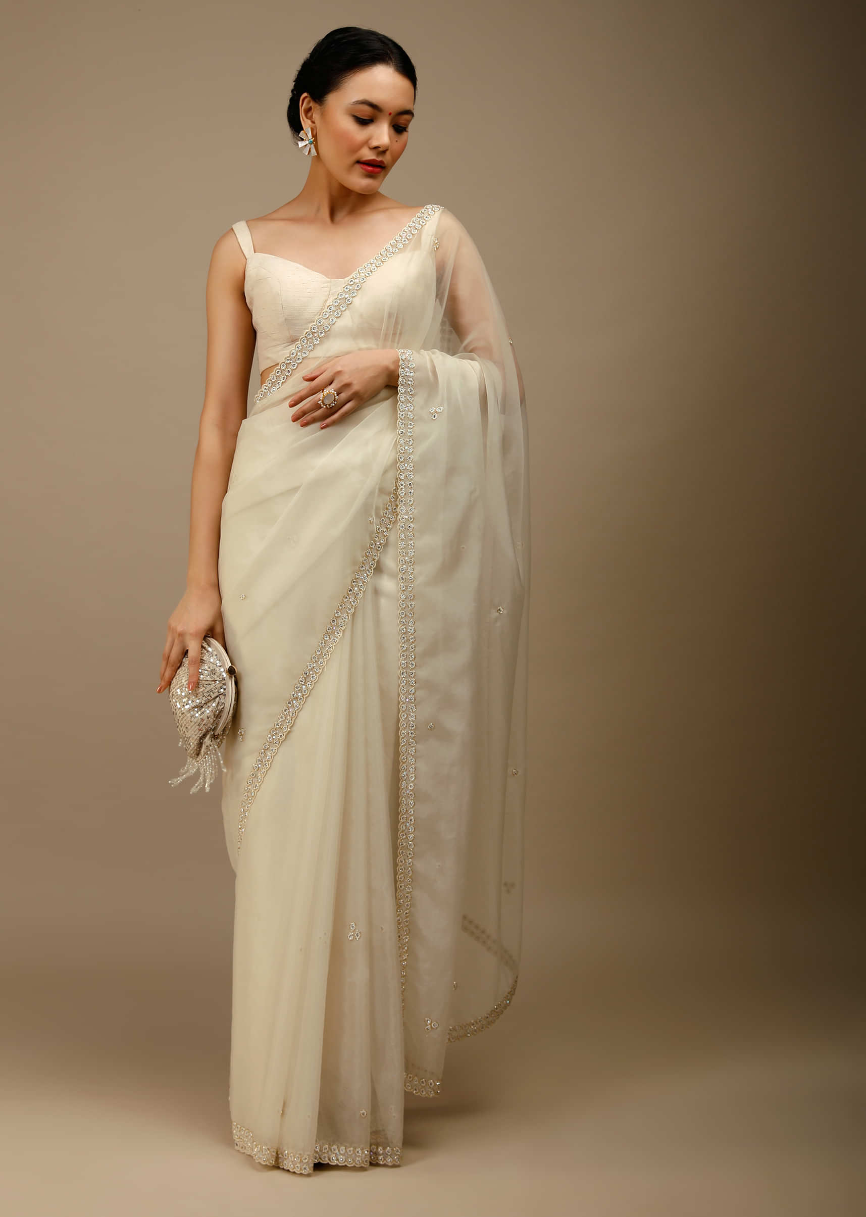 Marshmallow White Saree In Organza With Moti Beads And Stone Embroidered Round Motifs On The Border And Butti Design  
