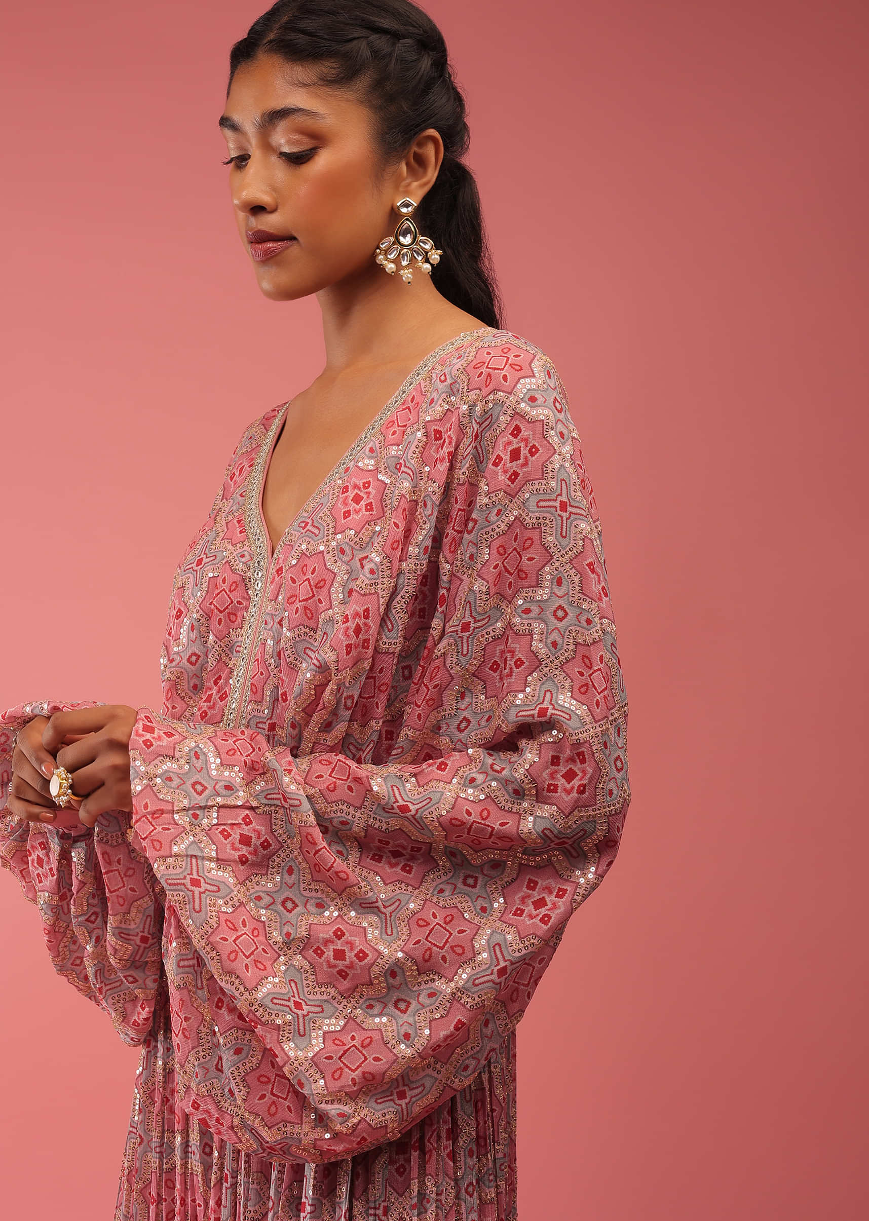 Mauve Pink Jumpsuit In Seamless Print With Golden Zari Embroidery, It Is Crafted In Organza With Balloon Sleeves