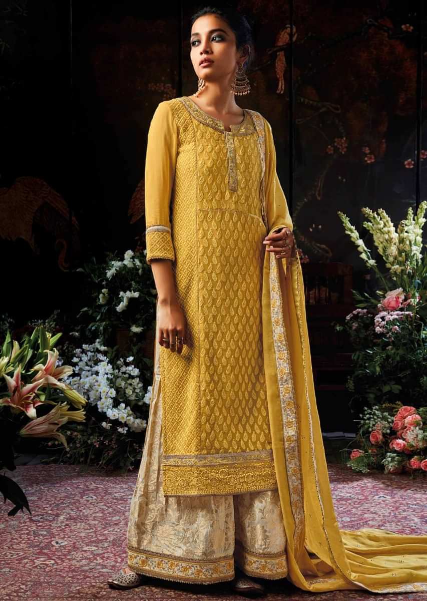 Medallion yellow unstitched suit embellished in thread and resham embroidery 