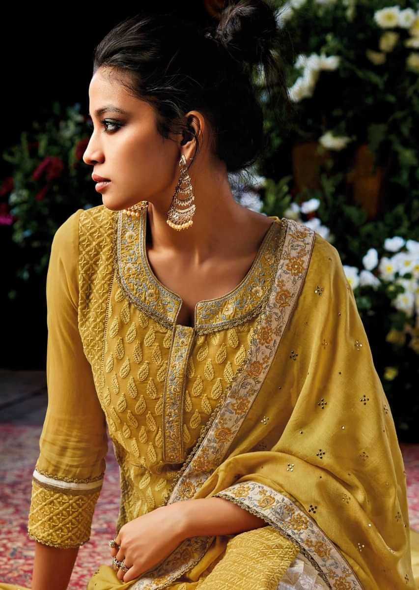 Medallion yellow unstitched suit embellished in thread and resham embroidery 