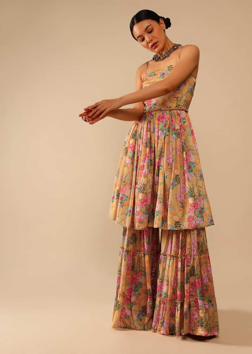 Mellow Yellow Sharara Suit In Crepe With Peplum Flared Kurti Adorned In Floral Print All Over  