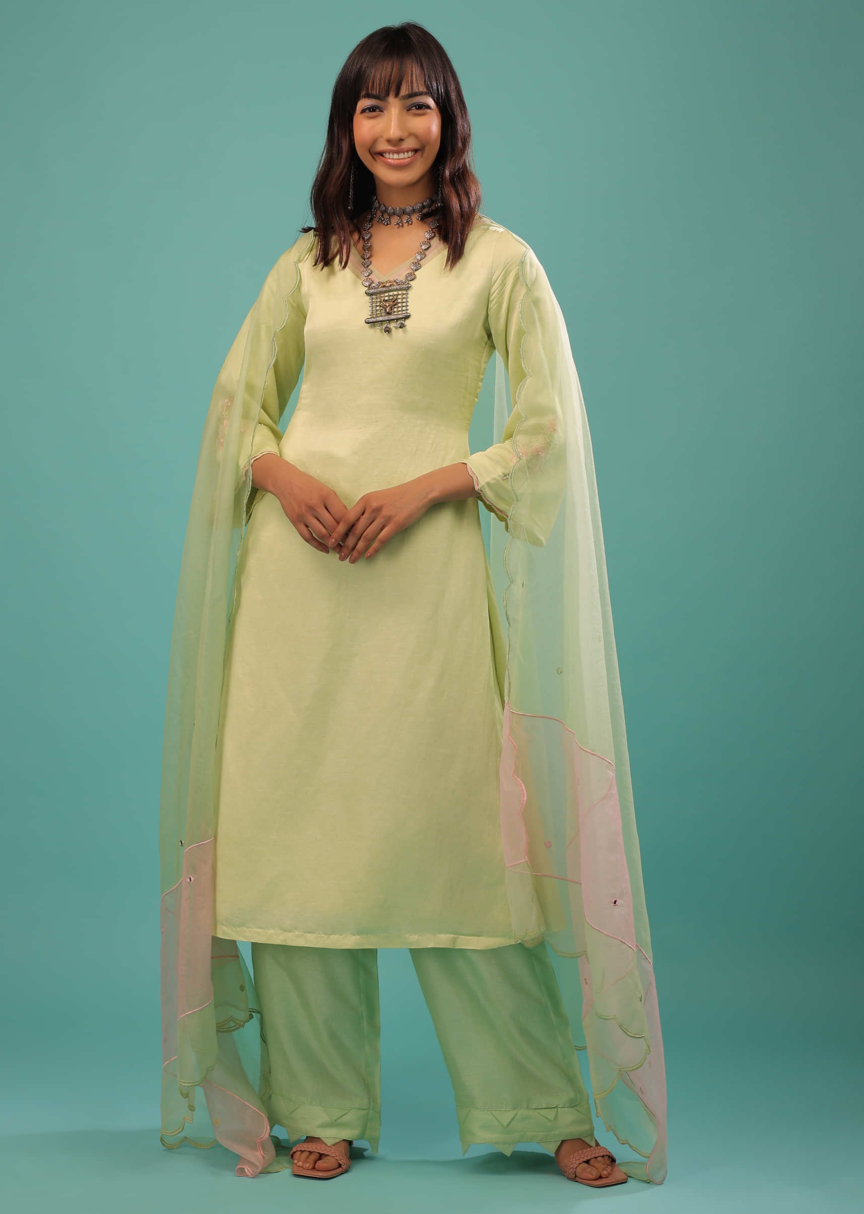 Mellow Green Linen Satin Straight Cut Palazzo Suit With Floral Embroidery On The Sleeves