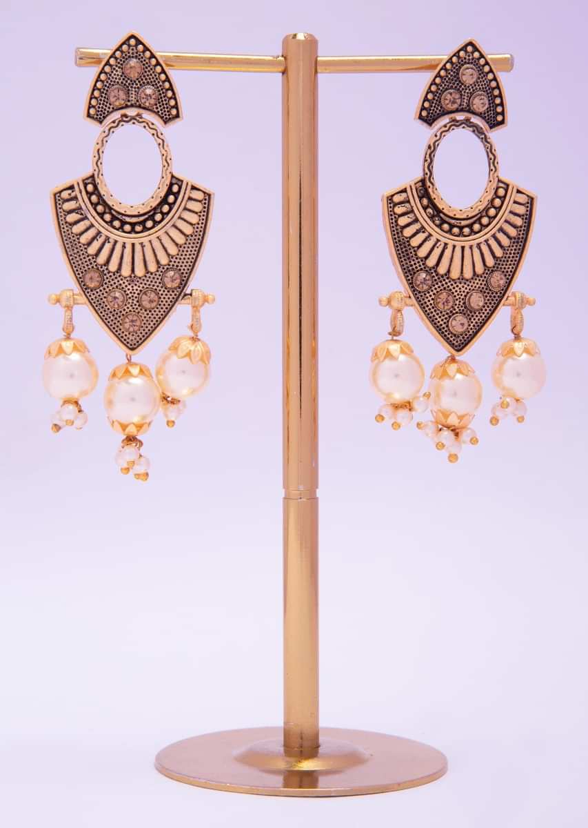 Metal coated fancy earring with pearls and beads only on kalki