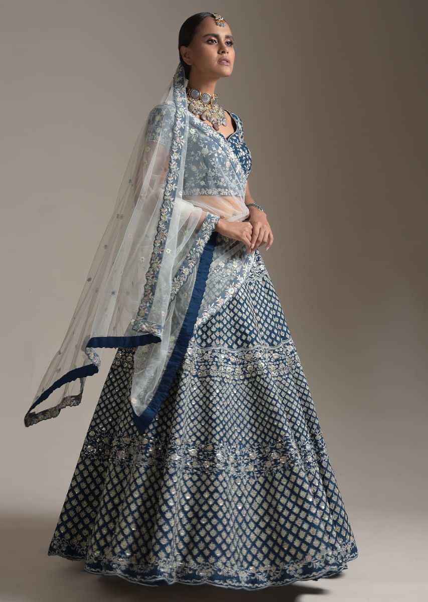 Midnight Blue Lehenga Choli In Raw Silk With Thread And Sequins Embroidered Buttis And Floral Design 