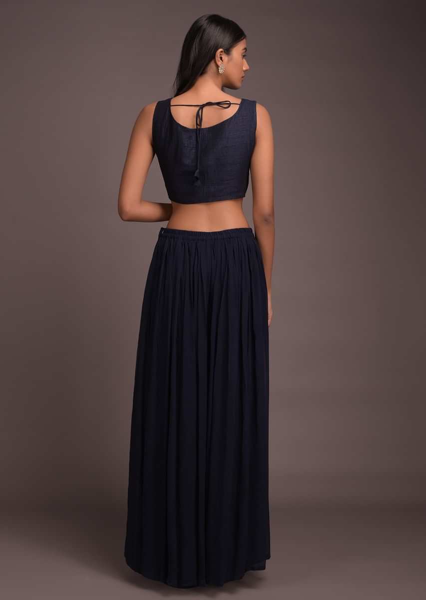Midnight Blue Palazzo Suit And Long Jacket With Ruffle Sleeves And Jaal Embroidered Crop Top  