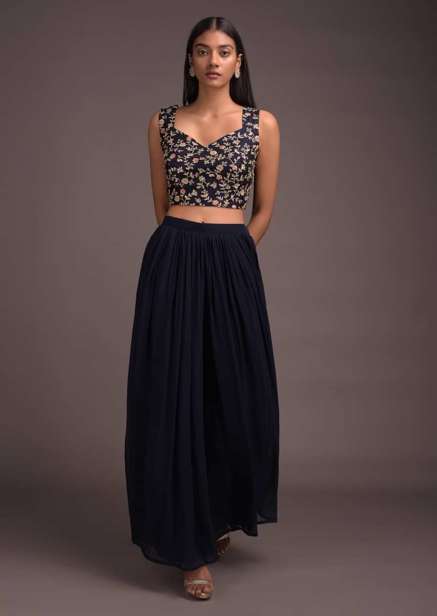 Midnight Blue Palazzo Suit And Long Jacket With Ruffle Sleeves And Jaal Embroidered Crop Top  