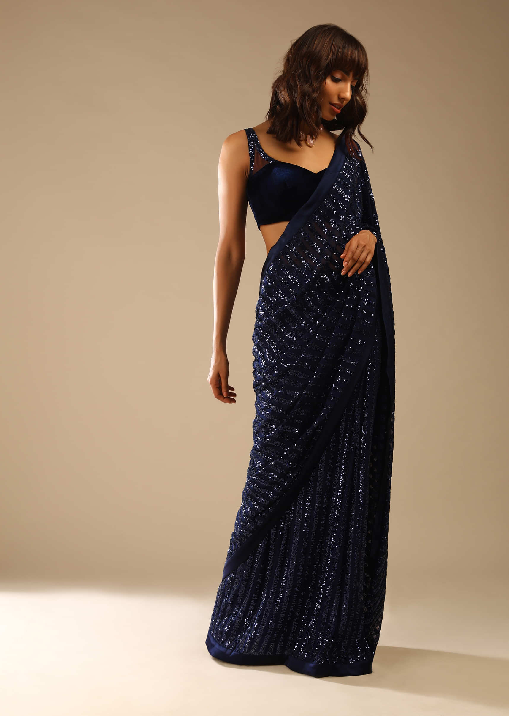 Midnight Blue Ready Pleated Saree Embellished In Sequins With A Matching Velvet Blouse Embellished In Sequins On The Straps  