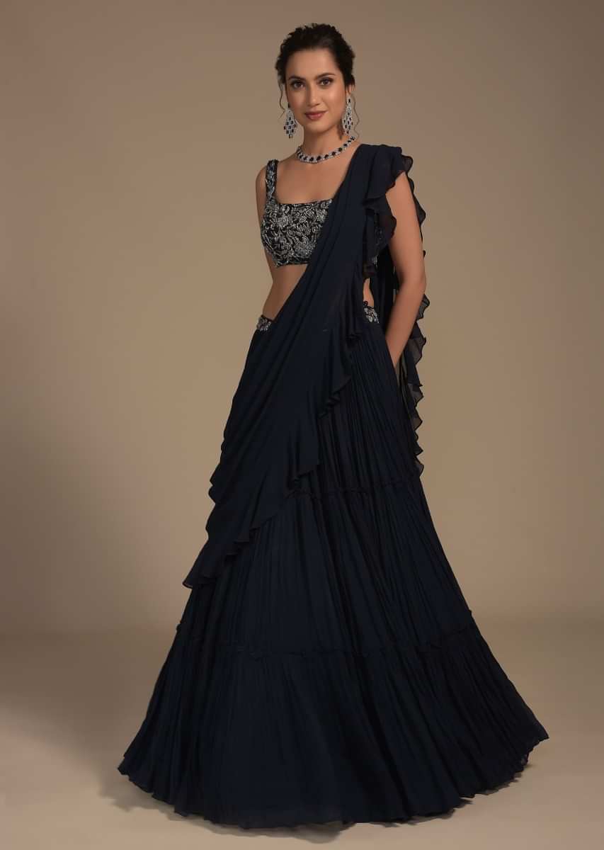 Midnight Blue Tiered Lehenga With Attached Ruffle Dupatta And Heavy Embroidered Crop Top 