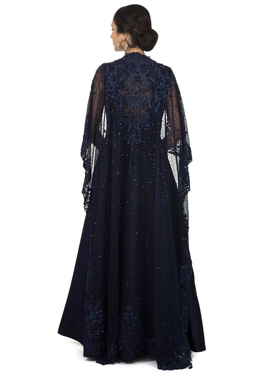 Midnight blue gown with embroidered attach cape