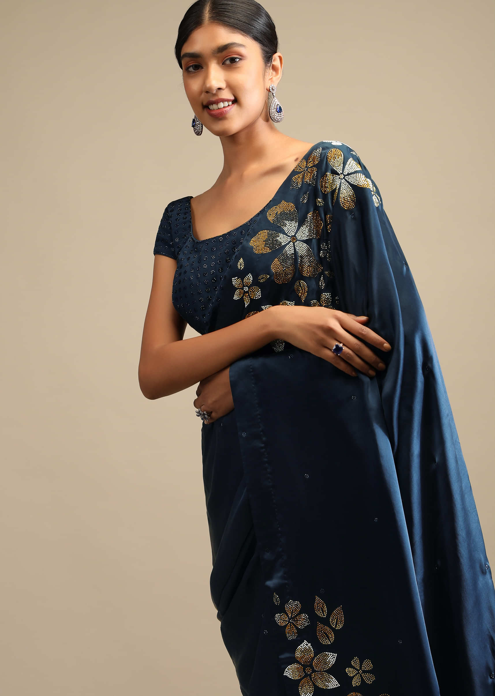 Midnight Blue Saree In Satin With Three Toned Kundan Embellished Floral Motifs Along The Border  