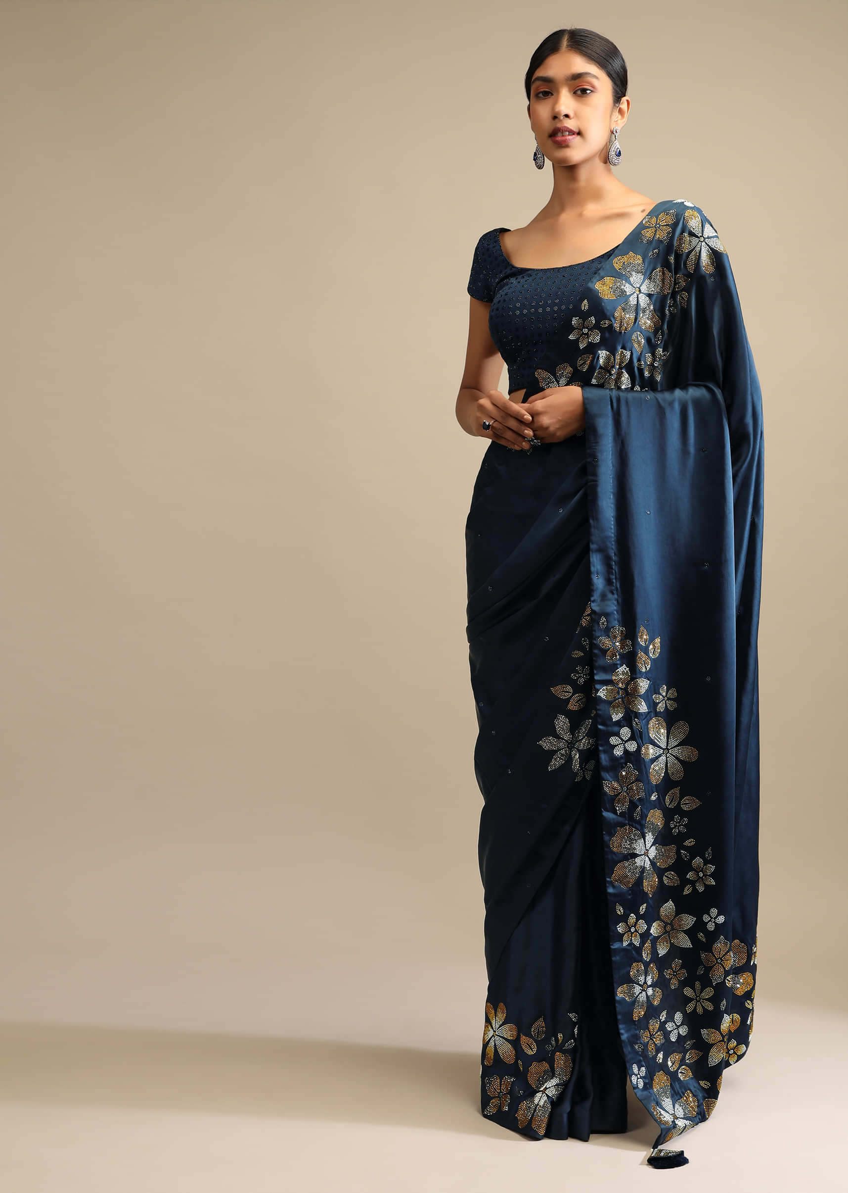 Midnight Blue Saree In Satin With Three Toned Kundan Embellished Floral Motifs Along The Border  