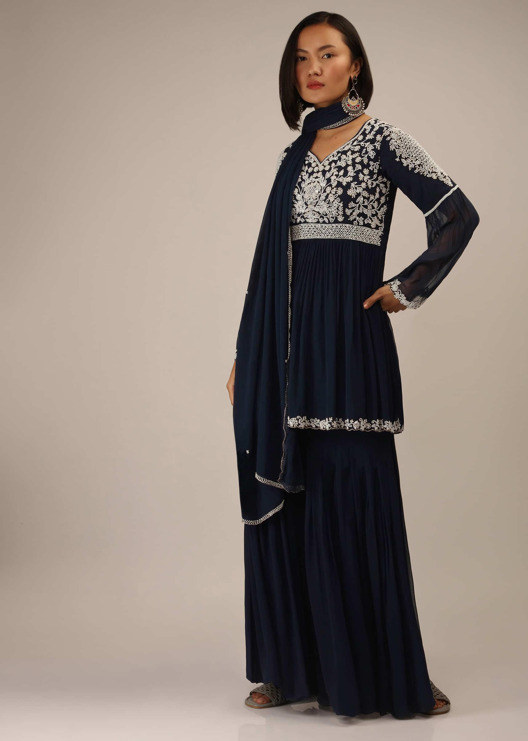 Midnight Blue Sharara And Peplum Suit With Moti And Sequins Embroidered Floral Design And Bell Sleeves