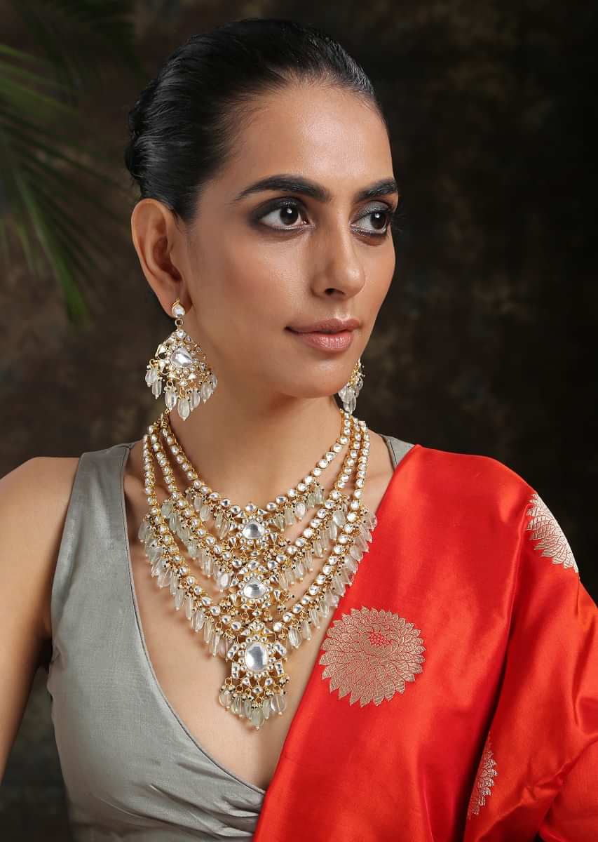 Mint And Gold Layered Necklace Set Adorned In Kundan Work In Floral Motifs, Pearls And Aquamarine Stones By Paisley Pop