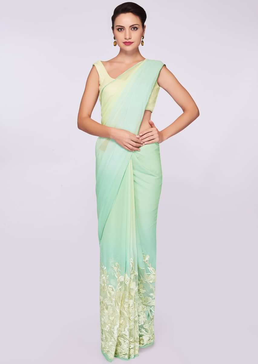 Mint blue and green shaded georgette saree with net embroidered bottom