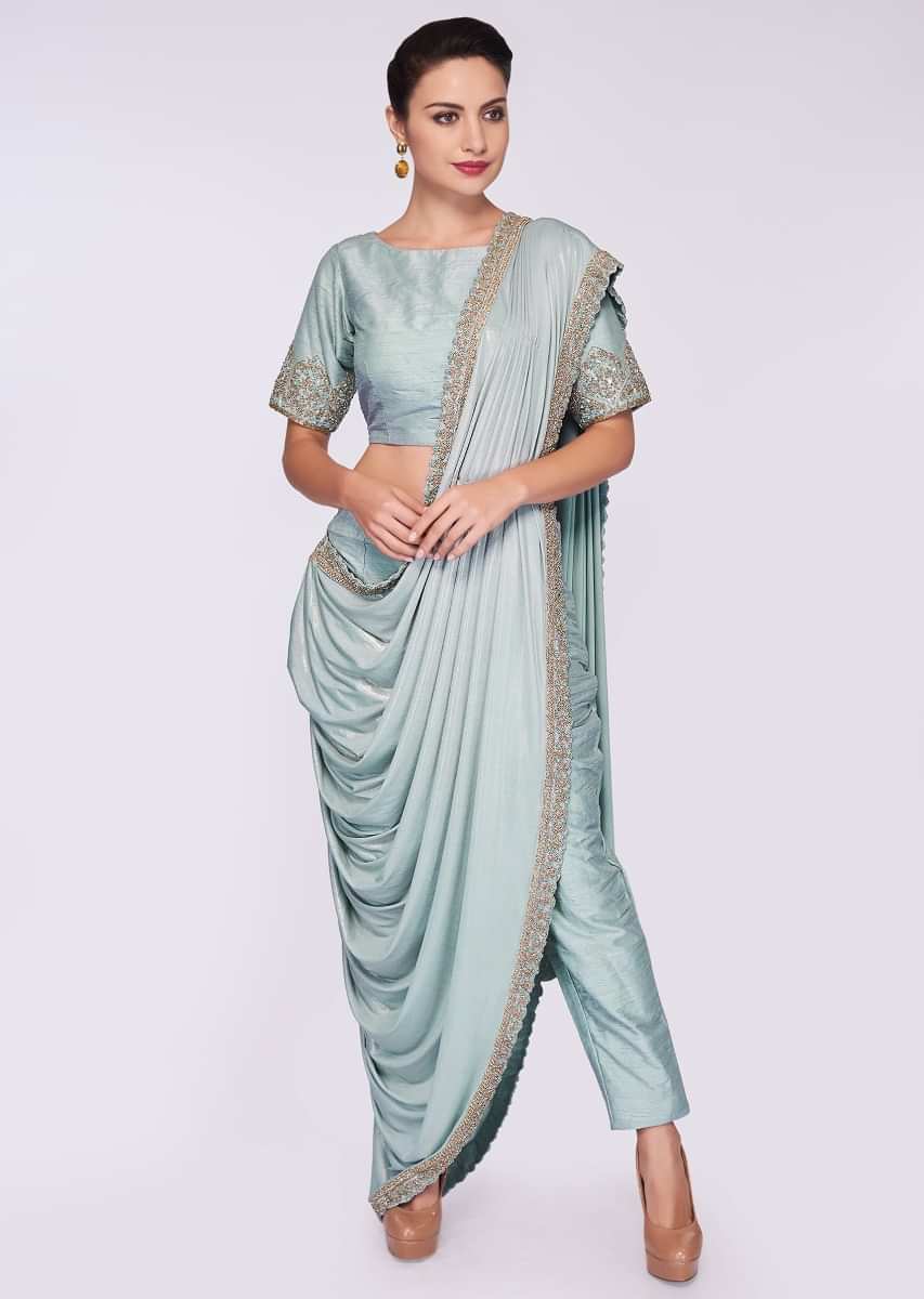 Mint blue saree with pant enhanced with a lycra top layer 