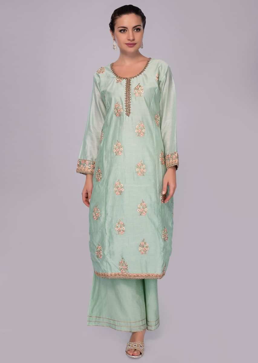 Mint green floral embroidered palazzo suit set with pink net dupatta.