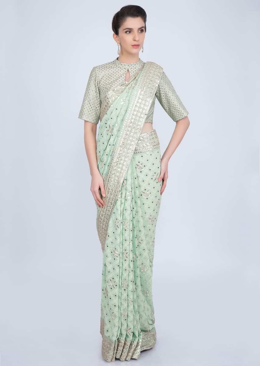 Mint green saree in lucknowi embroidered georgette  Online - Kalki Fashion