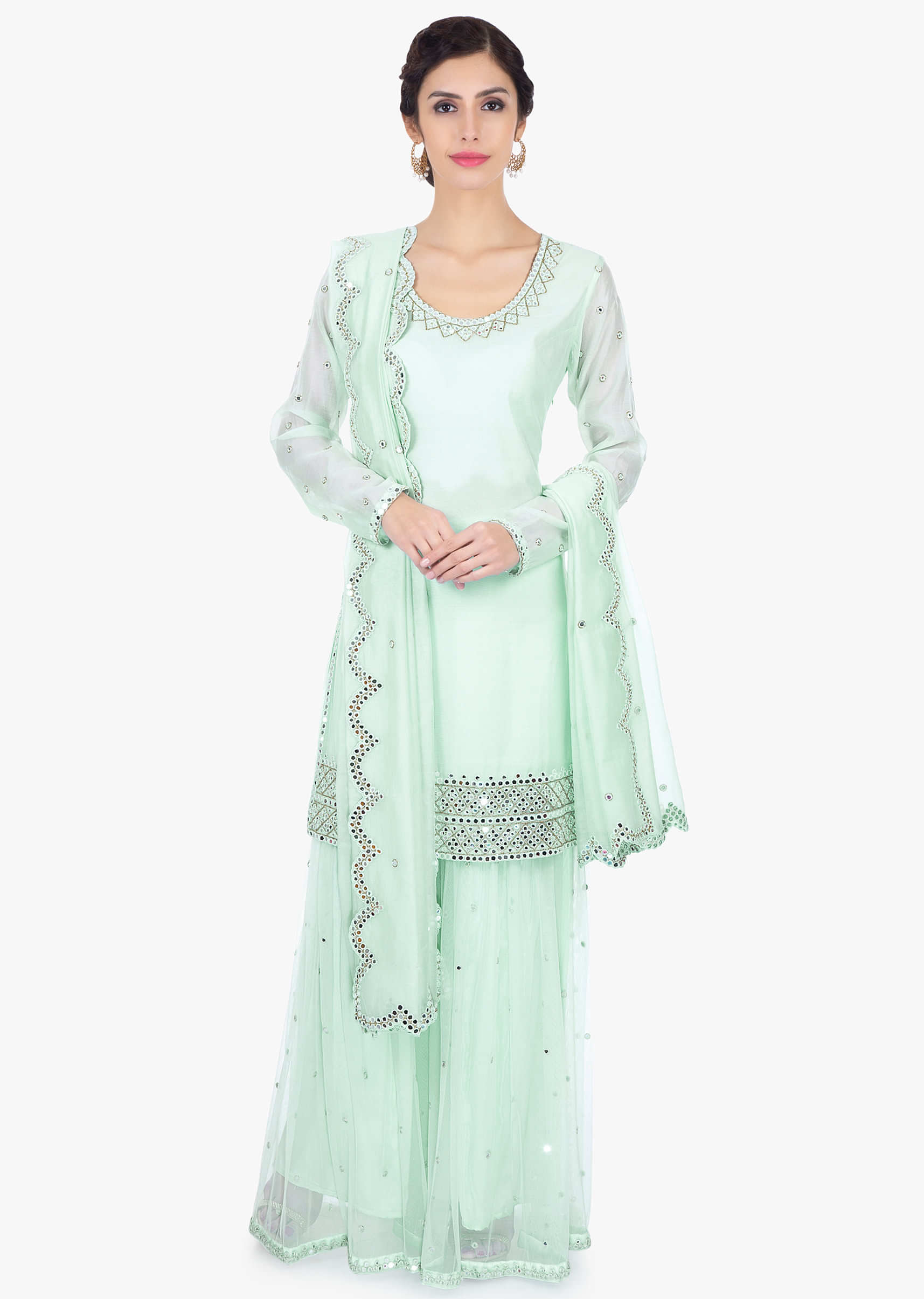 Mint green satin net sharara paired with a matching georgette suit