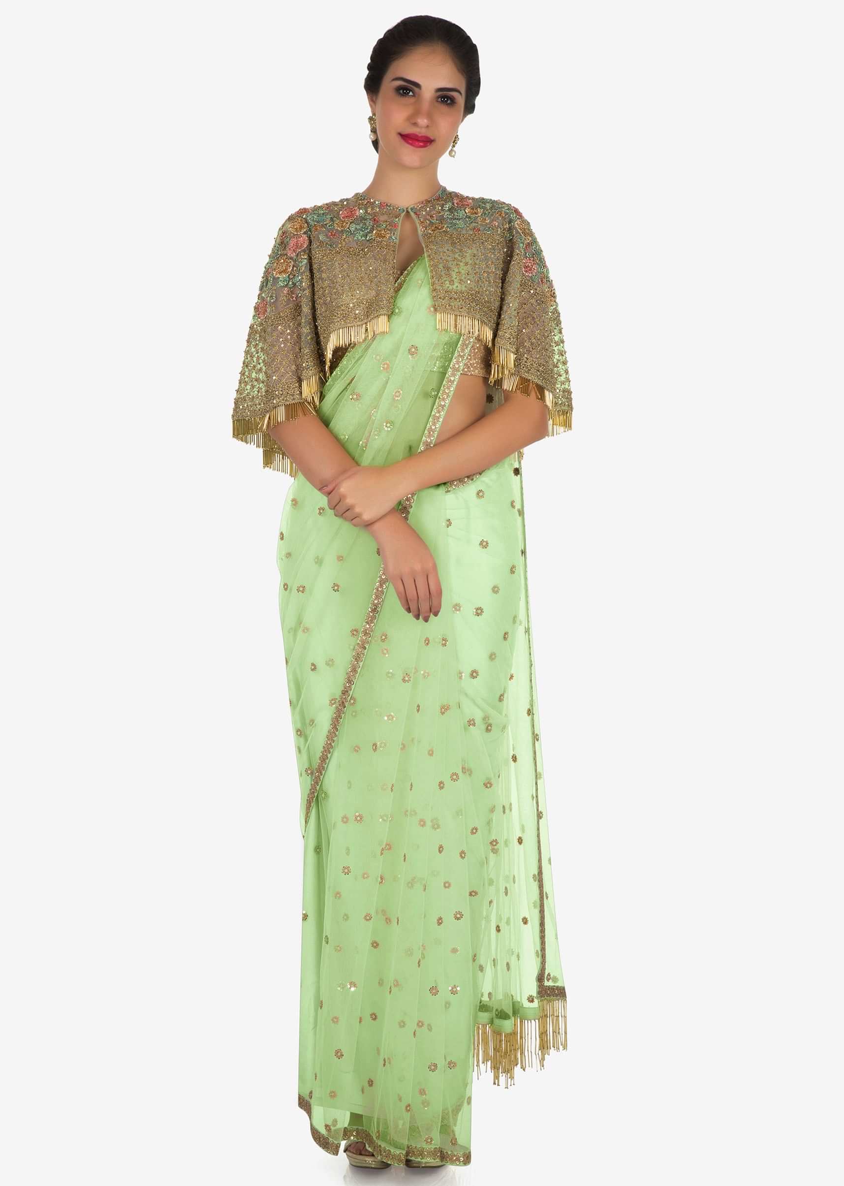 Mint blue saree with a fancy cape embellished in resham and zari embroidery work only on Kalki