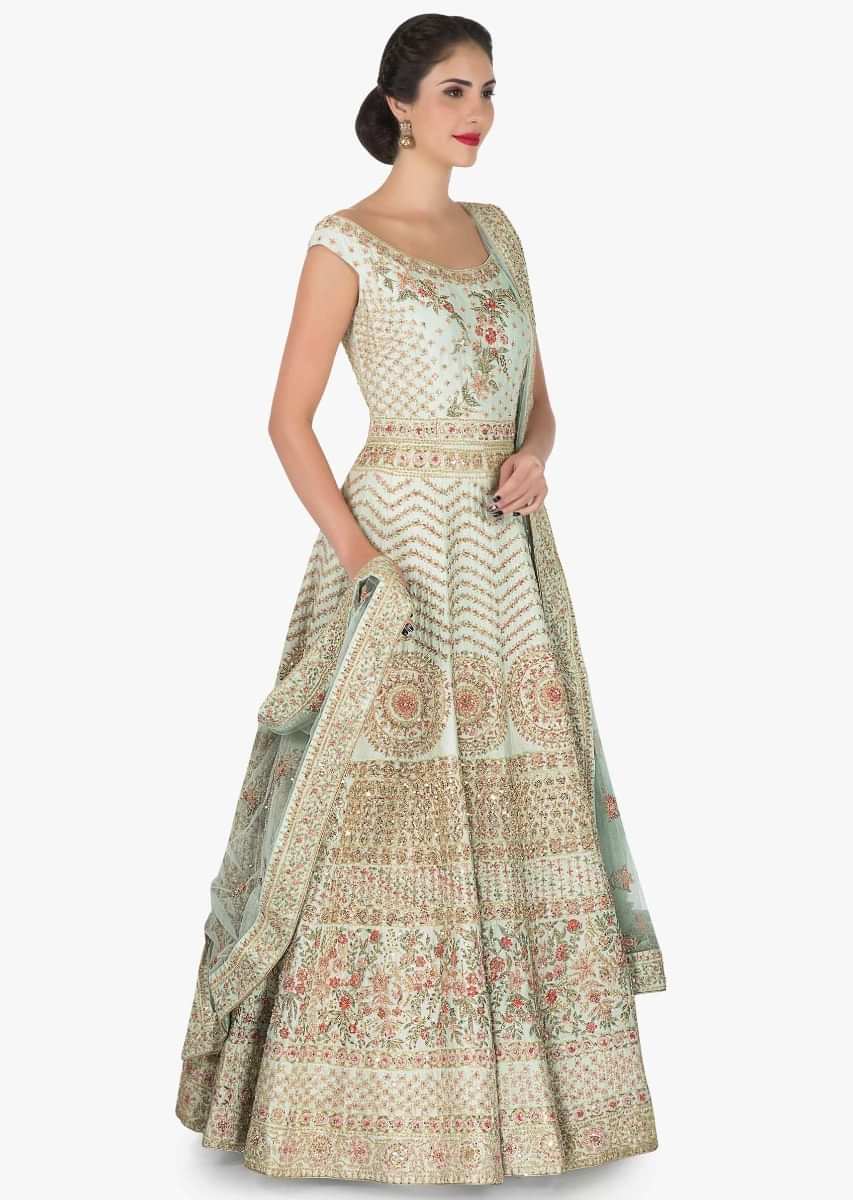 Mint green anarkali suit in silk enhanced in zari and resham embroidery work only on Kalki