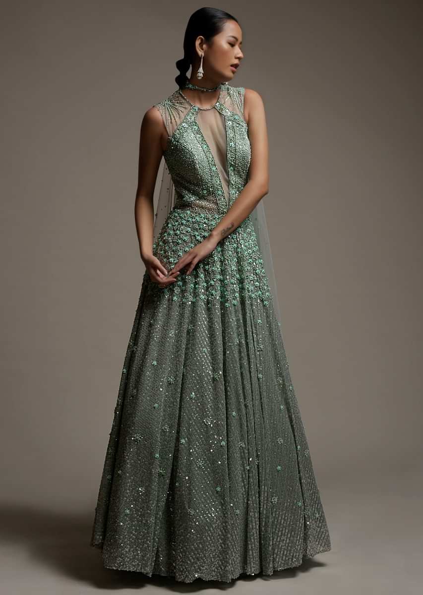 Mint Green Gown In Net With Sequins Work And Sheer Embellished Cut Outs On The Bodice Online - Kalki Fashion