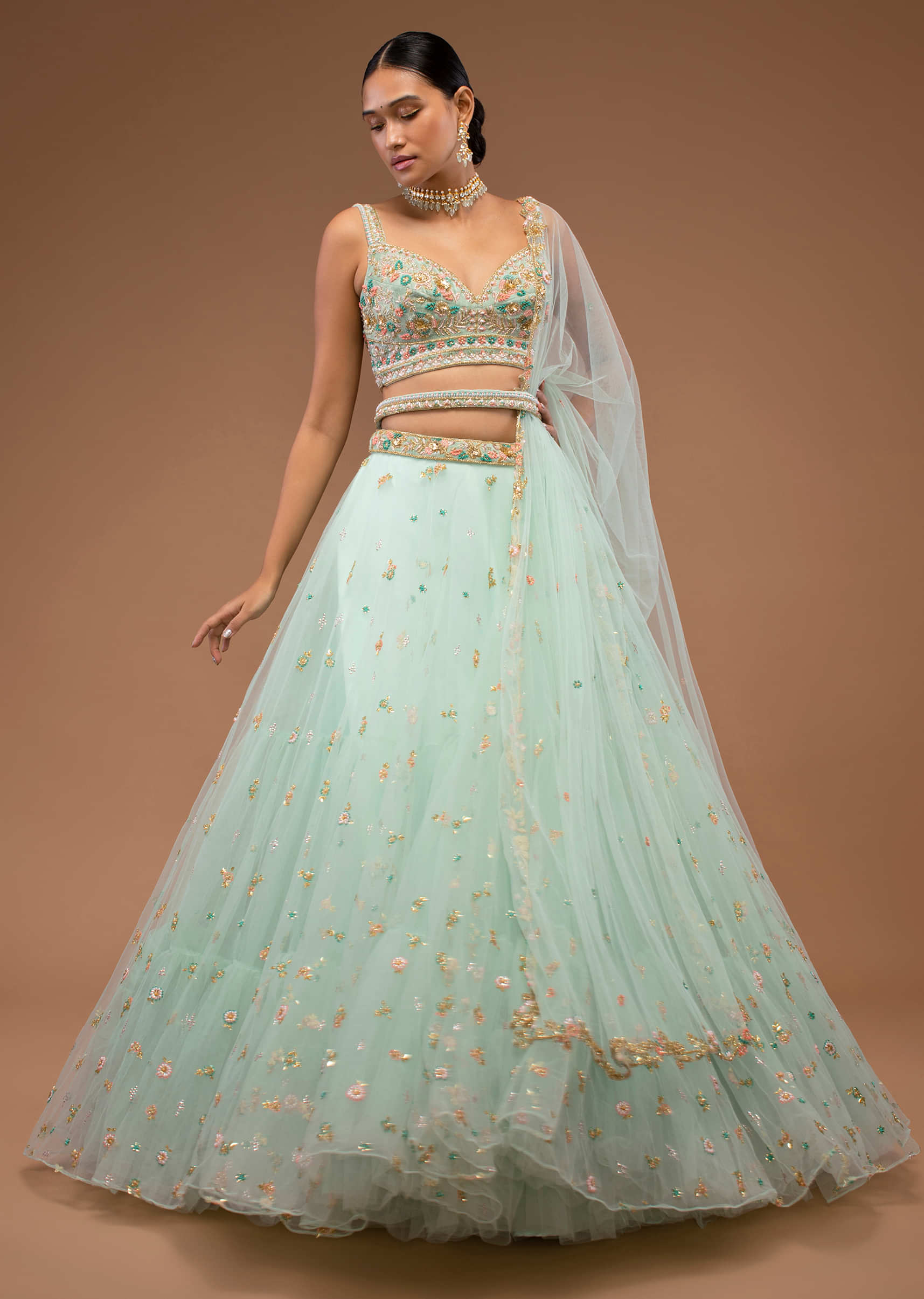 Mint Lehenga And A Crop Top Set In 3D Floral Motifs Embroidery, Crafted In Net With Sequins And Resham Work Floral Motifs