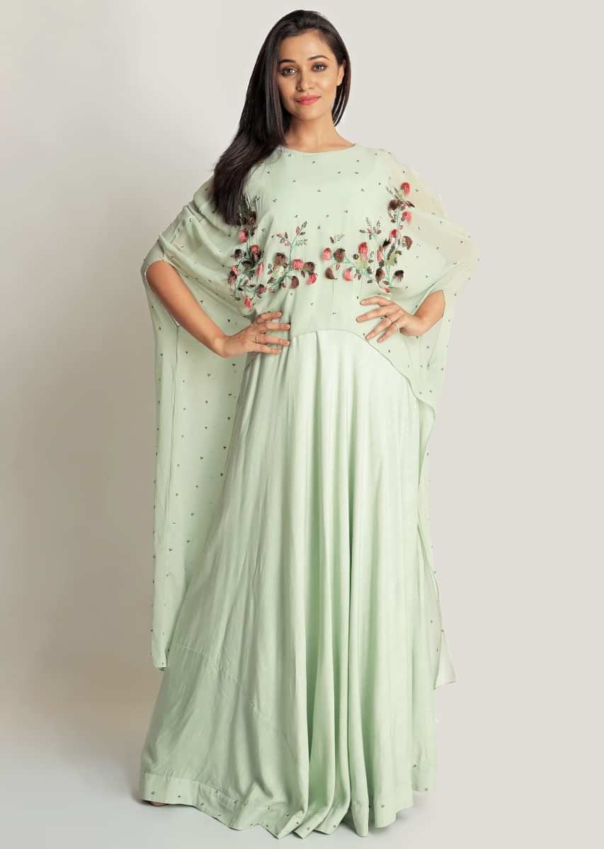 Mud green anarkali suit matched with cape in sequin and tassel embroidery