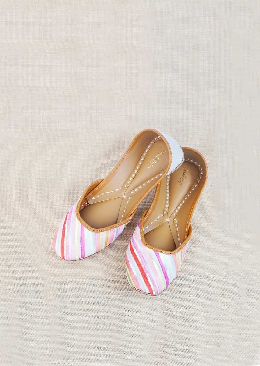 Multi Colored Juttis With Diagonal Stripe Print And Sequins Highlights By Vareli Bafna