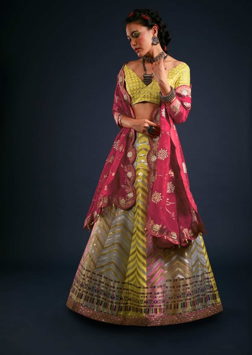 Multi Colored Panel Lehenga With Chevron Brocade Design And Contrasting Unstitched Blouse And Dupatta 
