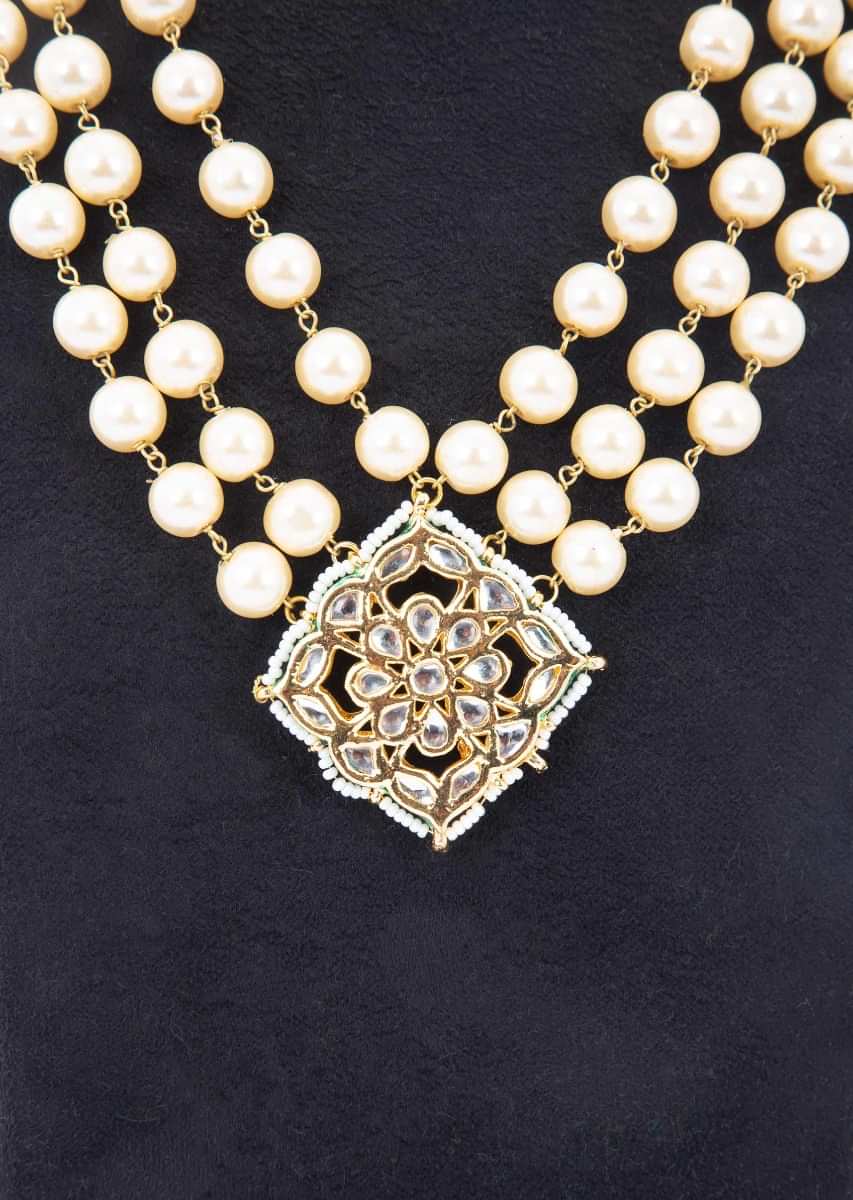 Multi layer cream pearls necklace with kundan studded pendant only on kalki