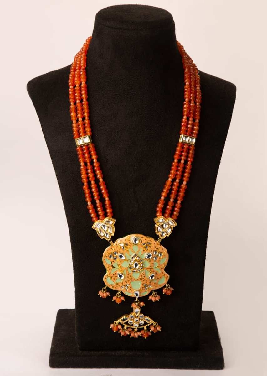 Multi string orange faceted bead necklace with peach meenakari pendant
