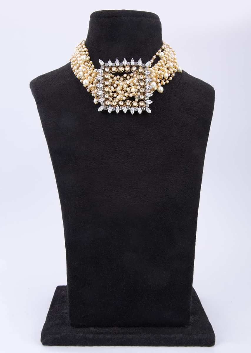 Multi string pearl studded chocker with square pendant adorn with kundan and Stone only on Kalki