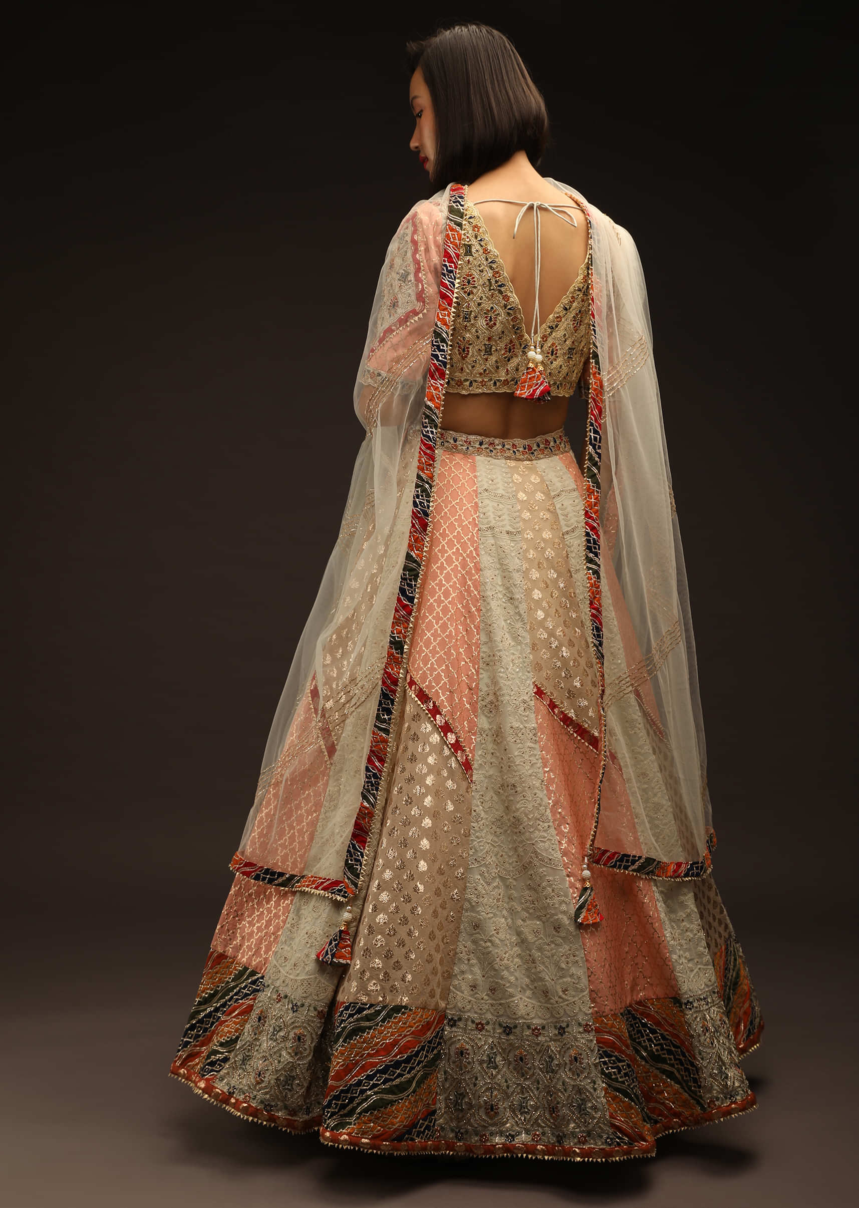 Multi Colored Lehenga Choli With Alternating Kalis Featuring Brocade Detailing And Lucknowi Thread Work
